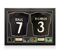 Maglie nere del Real Madrid autografate da Raul e Roberto Carlos. Incorniciate.