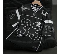 Maglietta a maniche corte oversize in stile accademico da strada, con stampa digitale del numero 33 e della scritta "Los Angeles" in stile hip-hop di . Questa maglia presenta un design a blocchi di co