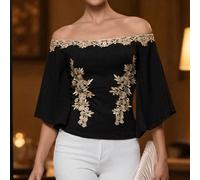 Maglietta da donna elegante e sexy con decoro floreale dorato sulle spalle, con applicazione dorata in vita, maniche a campana in maglia elastica di colore unito, scollo ad una spalla, adatta per le d