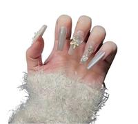 Manicure for temperamento, manicure chiara, indossando un cerotto sbiancante for unghie esteso.(L)