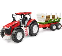 Trattore ROADMAX con rimorchio e tronchi