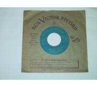 Merry Christmas Polka b/w Your Kiss (45 RPM)