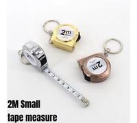 Mini metro a nastro portatile Piccolo nastro di misurazione domestico retrattile 2 m Metro a nastro portachiavi in acciaio dolce Mini strumenti di misurazione