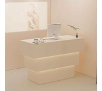 Moderno banco reception con illuminazione soffusa, elegante bancone frontale per saloni e vendita al dettaglio, tavolo da reception dal design contemporaneo per una migliore esperienza del cliente