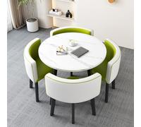 Moderno tavolo da pranzo rotondo con sedie verdi, piccolo tavolo da pranzo per un'esperienza di pranzo semplice ed elegante