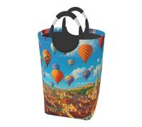 Mongolfiere che fluttuano sopra la città. Cesto portabiancheria impermeabile e pieghevole in tessuto Oxford.