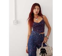 Monki - Top a corsetto in denim blu scuro con stampa effetto schizzi di vernice rosa in coordinato 36