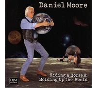 Moore Daniel - Riding a Horse & Holding Up Th