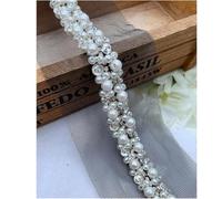Nastro con finiture in pizzo con strass e perline