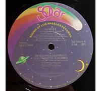 Never Underestimate The Power Of A Woman [12" Maxi]