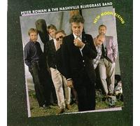 New Moon Rising by Peter Rowan (1989-05-01)