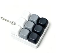 New Nine-key Keyboard Decompression Toys, Milk Theme Color Matching 2.0 Series Toy Key Chain Compression Button Finger Clicker Gift To Relieve Stress(Sésamo negro)