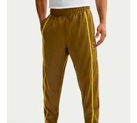 Pantaloni da tennis da uomo Nike Court Heritage - olive flak/saffron quartz - Verde (S)