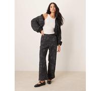 Nike - MDC - Pantaloni a fondo ampio a fiori jacquard neri e grigi-Nero XS