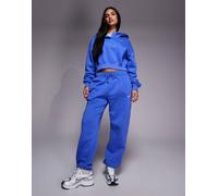 Nike - Phoenix Fleece - Joggers oversize a vita alta blu con polsino L