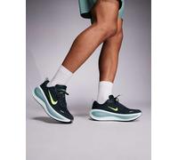 Nike Running - Vomero Plus - Sneakers verde scuro e gialle MW 10