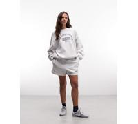 Nike - Studio - Pantaloncini grigio chiaro in pile stile college XXL