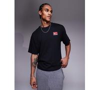 Nike - T-shirt squadrata nera con logo rétro-Nero M