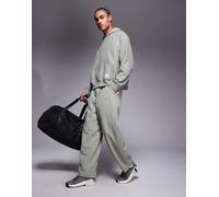 Nike Training - Athletic Club - Pantaloni sportivi grigi con logo a toppa-Grigio M