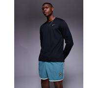 NIKE Pantaloni sportivi 'HERITAGE' blu chiaro / bianco, Taglia S