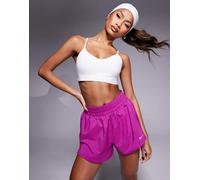 Nike Training - Indy - Reggiseno sportivo con sostegno leggero, colore bianco L