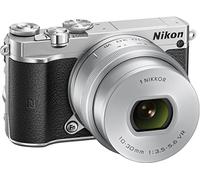 Nikon 1 J5 + 1 Nikkor 10-30 mm VR PD-ZOOM Fotocamera Digitale ad Ottiche Intercambiabili, 20,8 Megapixel, Video 4K, LCD Touchscreen Basculante 3", Argento [Versione EU]