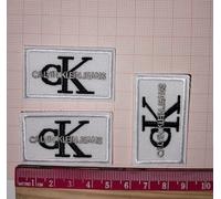 Nr. 3 Toppe Patch Calvin Klein termoadesive ricamate (come in foto)