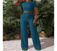 Nuovo completo casual sportivo basic, composto da t-shirt a maniche corte con collo tondo e pantaloni a gamba ampia superlunghi, in tessuto lavorato a maglia a righe rosa rosso, stile primavera/estate