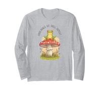 obiettivi rana seduta. freddo. ripetere. carino rana sul fungo Maglia a Manica