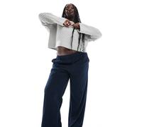 ONLY Curve - Pantaloni a fondo ampio in tessuto a coste color blu navy 50