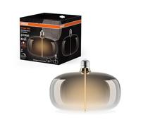 OSRAM Vintage 1906 Big Elipse è una lampada LED dimmerabile con filamento a forma di ellisse. Offre 4 W per 60 lm, attacco E27, design fumé, diametro 215 mm, resa cromatica CRI 80, 1800 K.