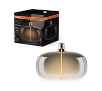 OSRAM Vintage 1906 Big Elipse è una lampada LED dimmerabile con filamento a forma di ellisse. Offre 4 W per 60 lm, attacco E27, design fumé, diametro 215 mm, resa cromatica CRI 80, 1800 K.