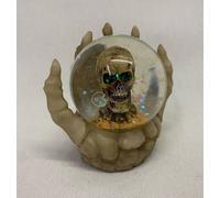 Palla di neve teschio nella mano dello scheletro Puckator altezza 6 cm skull