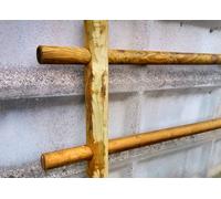 Palo tondo in legno impregnato cm Ø12x150 con punta doppio foro per recinzioni