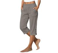 Pantaloni corti beige da donna con bottoni sull'orlo esterno, pull on | Le gambe corte rilassate finiscono sotto il ginocchio, con piccoli bottoni lungo ogni orlo esterno e una chiusura visibile in