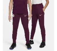 Pantaloni da calcio in maglia Nike Dri-FIT Paris Saint-Germain Strike - Ragazzo/a - Rosso S
