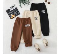 Pantaloni della tuta lunghi casual da ragazzo, comodi, alla moda, minimalisti, pratici e versatili, con decorazione a toppe e tasche, adatti per il ritorno a scuola, l'uso quotidiano, la scuola, i via