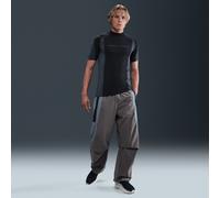 Pantaloni oversize in tessuto Dri-FIT con blocchi di colore Nike Tech - Uomo - Grigio S