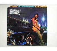 Parsons, Gram Sleepless Nights LP A&M AMLH64578 EX/EX 1976 with the Flying Burrito Bros, 1st UK issue. The sleeve is cut at the top left corner with pinking shears (zig-zag scissors