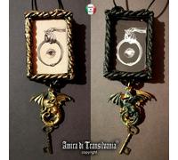 pendente magico talismano amuleto dragone occhio chiave alchimia 4 anelli potere