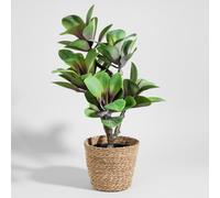 Pianta artificiale verde e vaso nero