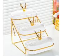 Piatto da piatto di frutta secca vassoio che serve per le caramelle snack di