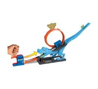 Hot wheels city - playset sfreccia sul t-rex, pista acrobatica con loop gigante e mega dinosauro t-rex, 1 macchinina in scala 1:64 inclusa, giocattolo per bambini, 4+ anni, hkx42