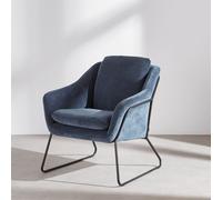 Poltrona effetto velluto blu di Prussia