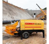 Pompa per calcestruzzo idraulica per rimorchi per progetti di ponte e tunnel, edifici residenziali e costruzioni commerciali, fornendo un flusso di calcestruzzo affidabile