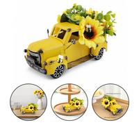 Porta la gioia dei girasoli in cucina con arredamento camion in metallo giallo