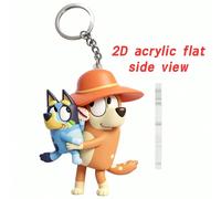 Portachiavi 2D a tema Bluey, con Bluey e un amico che guidano una simpatica auto viola con dettagli giocosi. Realizzato in PVC liscio e resistente con colori vivaci, questo ciondolo fantasioso è perfe
