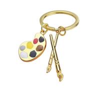 Portachiavi, gioiello per pallet e pennelli da pittore dorato.