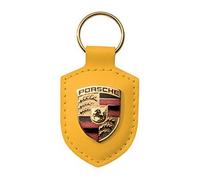 Portachiavi in pelle con stemma giallo Porsche.