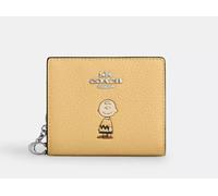 Portafoglio a scatto Coach x PEANUTS 2025 Charlie Brown CBN90 NUOVO Snoopy